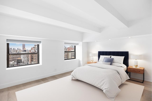 135 W 70th St Unit 10C, New York City, NY 10023 - bedroom with wood finished floors and baseboards