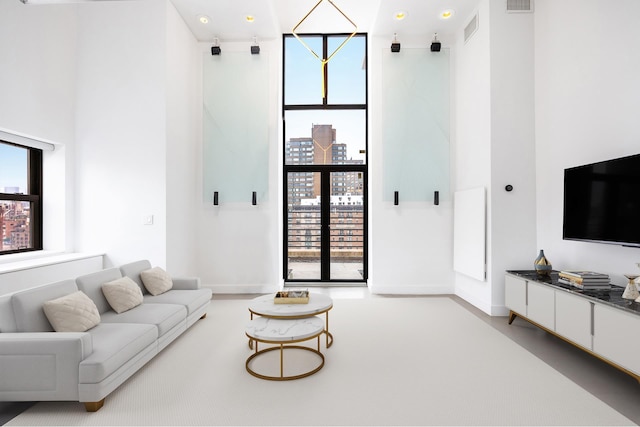 135 W 70th St Unit 10C, New York City, NY 10023 - living area featuring baseboards