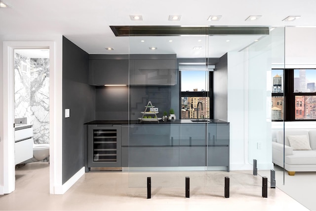 135 W 70th St Unit 10C, New York City, NY 10023 - indoor wet bar with wine cooler and recessed lighting