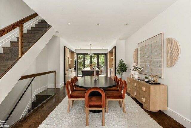 10 Hancock St, New York City, NY 11216 - dining room featuring stairway and wood finished floors