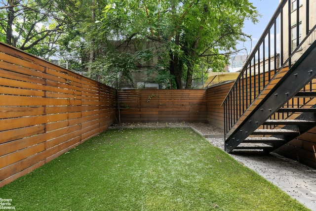 10 Hancock St, New York City, NY 11216 - fenced backyard with stairs