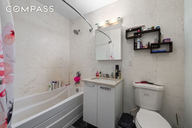 353 E 104th St Unit 2F, New York City, NY 10029 - bathroom with shower / tub combo, vanity, and tile walls