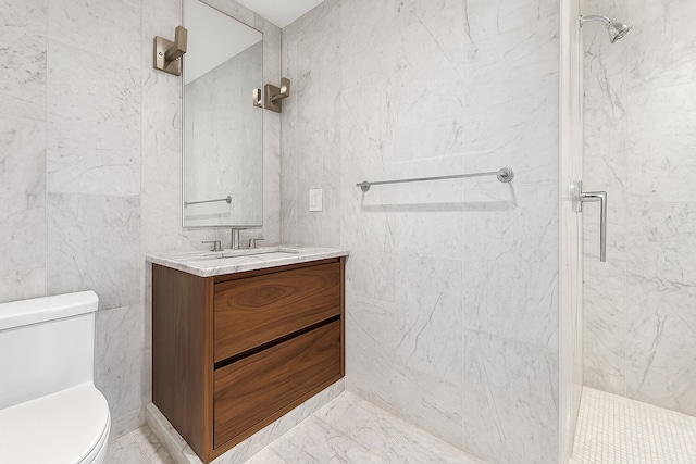 488 4th Ave Unit 6, New York City, NY 11215 - bathroom with a marble finish shower, vanity, and marble finish flooring