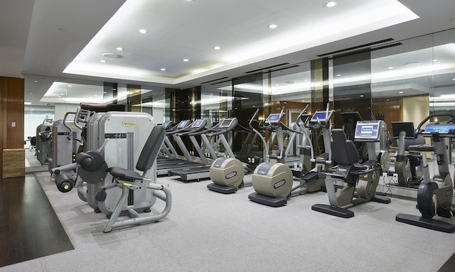 21 E 61st St Unit 9C, New York City, NY 10065 - workout area featuring a raised ceiling and recessed lighting