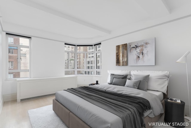 21 E 61st St Unit 9C, New York City, NY 10065 - bedroom with wood finished floors and baseboards