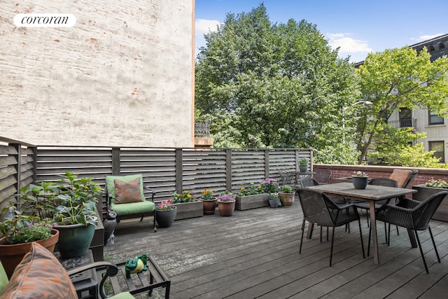8 8th Ave Unit 2B, New York City, NY 11217 - wooden terrace with outdoor dining space