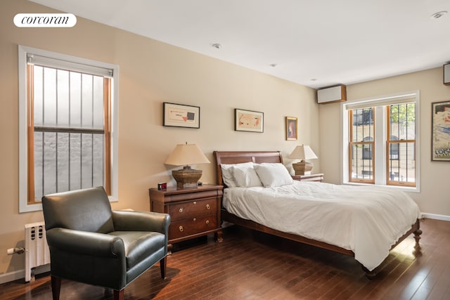 8 8th Ave Unit 2B, New York City, NY 11217 - bedroom with dark wood-style flooring and radiator heating unit
