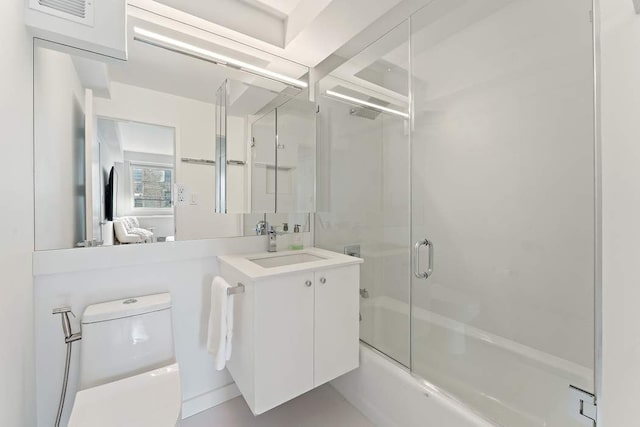 20 E 68th St Unit 12D, New York City, NY 10065 - bathroom featuring shower / bath combination with glass door and vanity