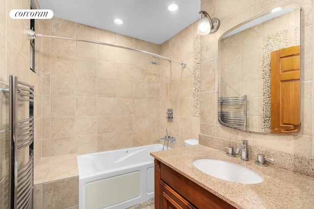 59-26 Catalpa Ave, New York City, NY 11385 - bathroom featuring radiator heating unit, washtub / shower combination, vanity, tile walls, and recessed lighting