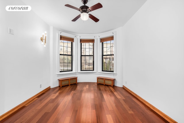 59-26 Catalpa Ave, New York City, NY 11385 - unfurnished room with wood-type flooring and ceiling fan
