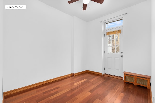 59-26 Catalpa Ave, New York City, NY 11385 - unfurnished room featuring wood finished floors and a ceiling fan