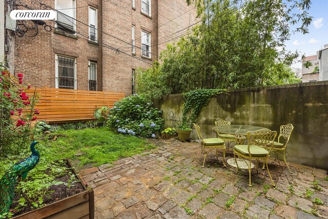 66 Putnam Ave, New York City, NY 11238 - view of patio featuring outdoor dining space