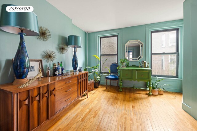 66 Putnam Ave, New York City, NY 11238 - living area with light wood-style floors and vaulted ceiling