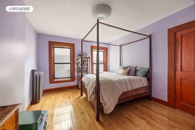 66 Putnam Ave, New York City, NY 11238 - bedroom with radiator and light wood finished floors