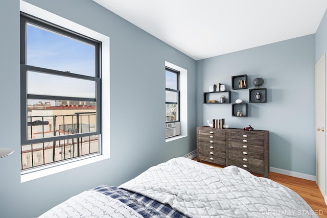 299 13th St Unit 4B, New York City, NY 11215 - bedroom with wood finished floors and baseboard heating