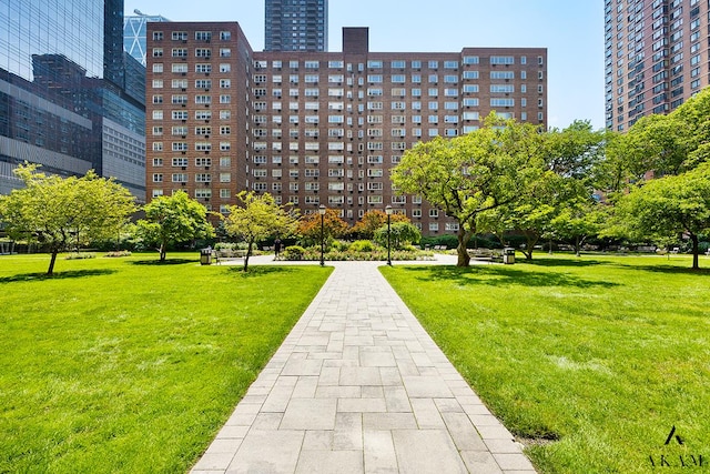 345 W 58th St Unit 8-D, New York City, NY 10019 - surrounding community featuring a lawn and a city view