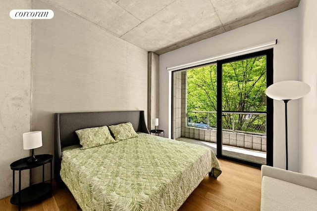 450 Warren St Unit 2C, New York City, NY 11217 - bedroom with wood finished floors and access to exterior