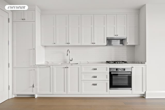 100 Claremont Ave Unit 12D, New York City, NY 10027 - kitchen featuring stainless steel appliances, white cabinetry, and light countertops