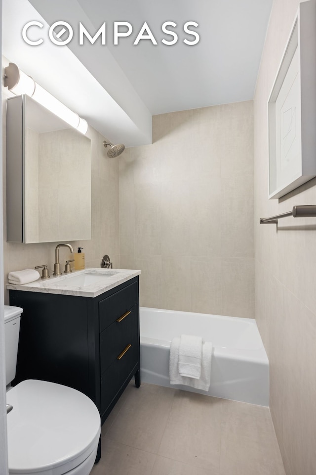 166 E 35th St Unit 5F, New York City, NY 10016 - full bathroom featuring tile patterned flooring, vanity, and bathtub / shower combination