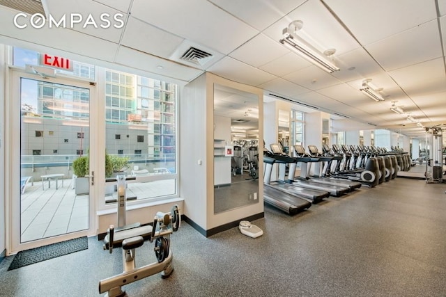247 W 46th St Unit 3103, New York City, NY 10036 - exercise room with plenty of natural light