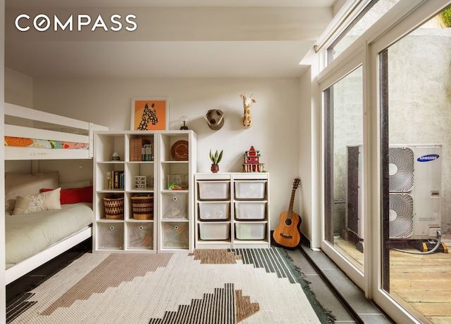 161 Jackson St Unit 1, New York City, NY 11211 - bedroom featuring access to exterior