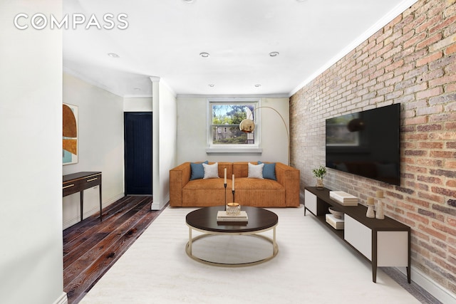 170 Skillman Ave, New York City, NY 11211 - living area with crown molding, wood finished floors, and brick wall
