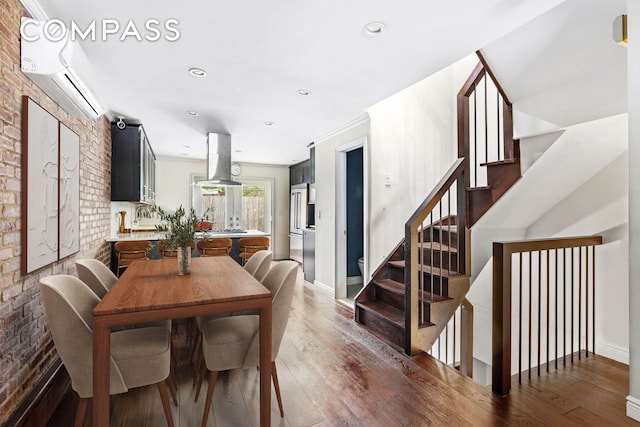 170 Skillman Ave, New York City, NY 11211 - dining area with wood-type flooring, brick wall, and recessed lighting