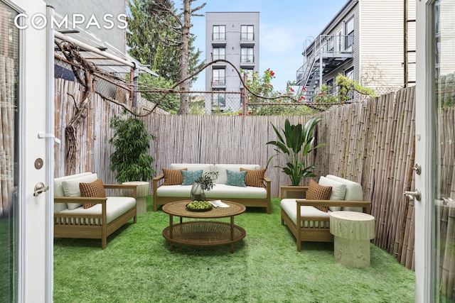 170 Skillman Ave, New York City, NY 11211 - fenced backyard with outdoor lounge area