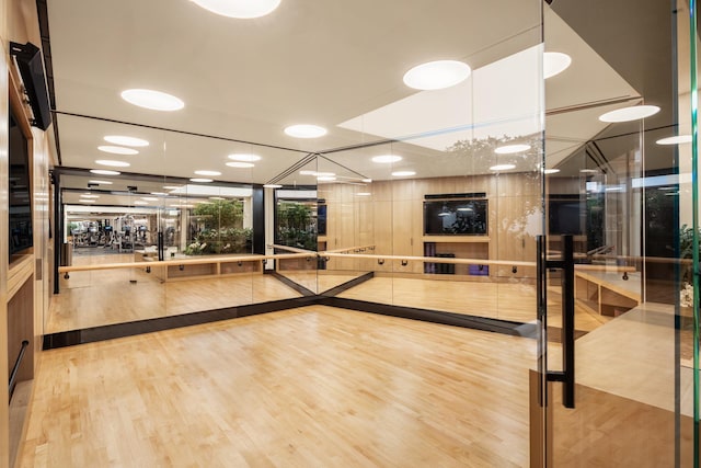 111 Murray St Unit 30A, New York City, NY 10007 - workout room with wood finished floors and recessed lighting