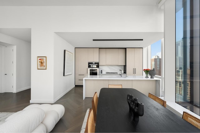 111 Murray St Unit 30A, New York City, NY 10007 - kitchen with light countertops, a peninsula, and modern cabinets