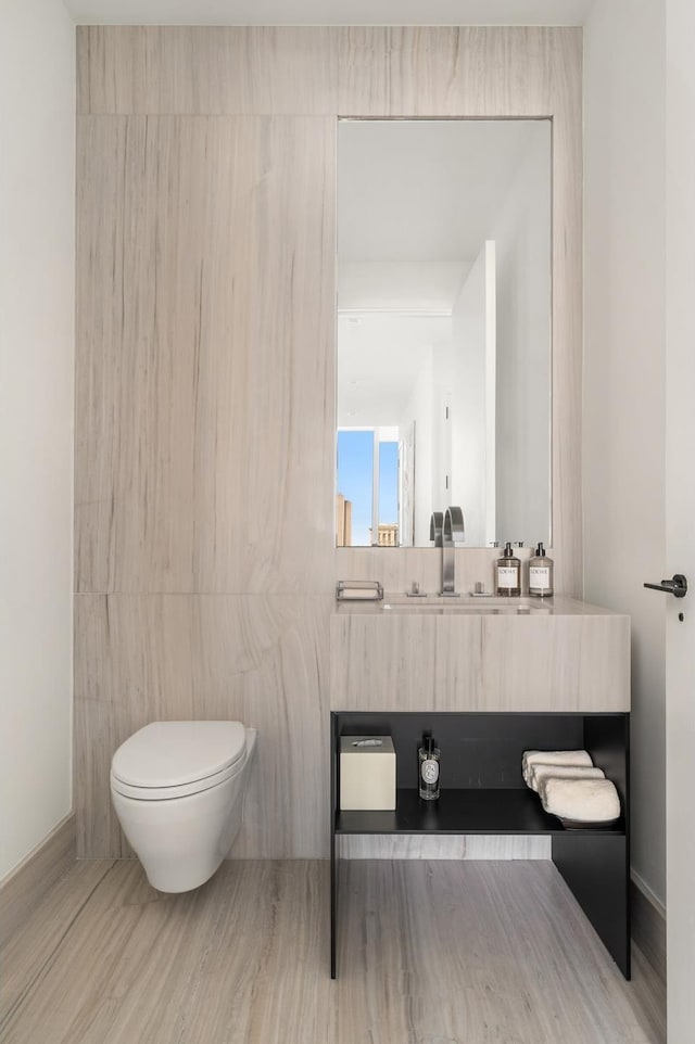 111 Murray St Unit 30A, New York City, NY 10007 - bathroom featuring vanity and wood finished floors
