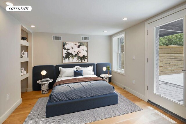 824A Quincy St, New York City, NY 11221 - bedroom featuring light wood finished floors, access to outside, and recessed lighting
