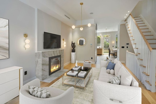 824A Quincy St, New York City, NY 11221 - living room with stairway, wood finished floors, a premium fireplace, and recessed lighting
