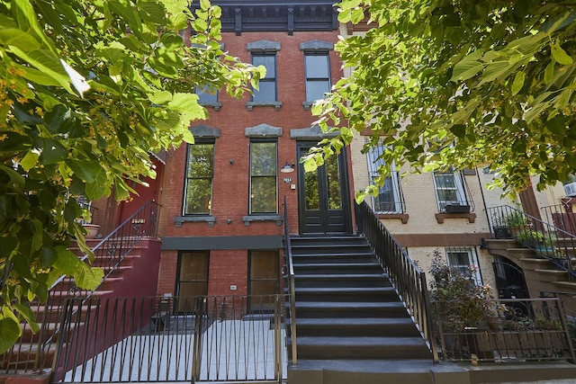 824A Quincy St, New York City, NY 11221 - view of front facade with stairway and brick siding