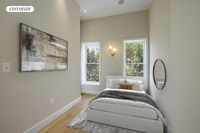 824A Quincy St, New York City, NY 11221 - bedroom with light wood-style floors and recessed lighting