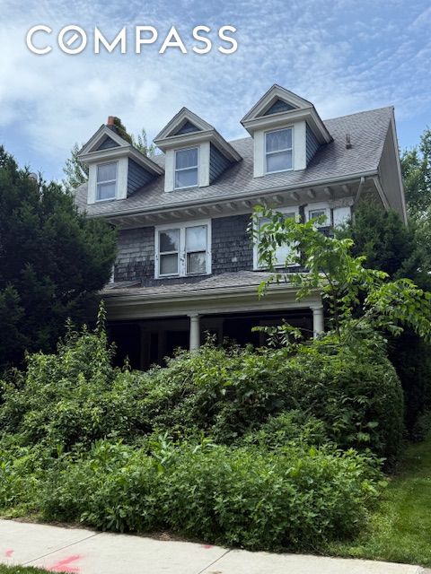 202 Marlborough Rd, New York City, NY 11226 - view of front of home with a chimney