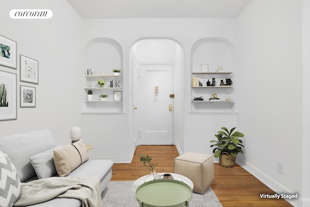 1485 E 16th St Unit 1J, New York City, NY 11230 - living room featuring wood finished floors