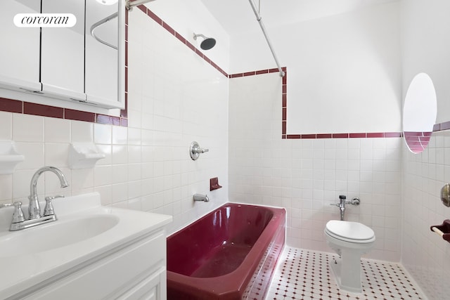 1485 E 16th St Unit 1J, New York City, NY 11230 - full bath featuring tile walls, vanity, and tile patterned flooring