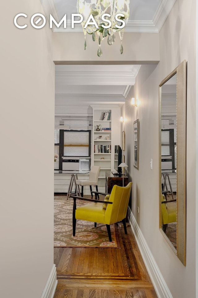 235 W 102nd St Unit 3B, New York City, NY 10025 - hall with a chandelier, crown molding, wood finished floors, and built in shelves
