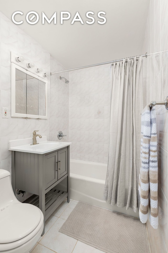 342 E 53rd St Unit 1G, New York City, NY 10022 - bathroom with shower / tub combo, vanity, and tile patterned floors