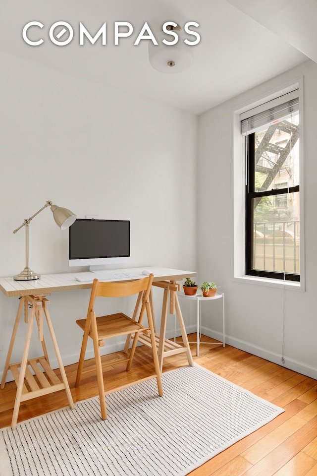 342 E 53rd St Unit 1G, New York City, NY 10022 - home office with light wood-style floors and baseboards