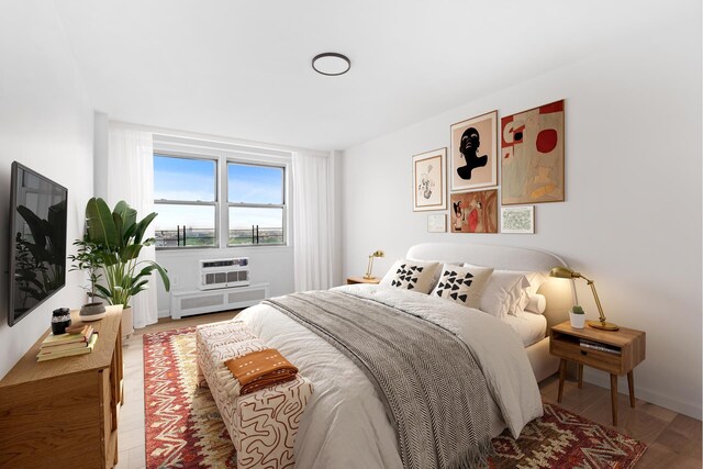 1655 Flatbush Ave Unit B1812, New York City, NY 11210 - bedroom with radiator and light wood-style flooring