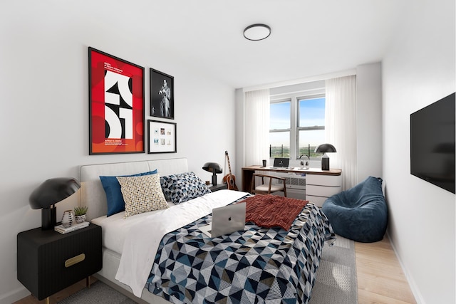 1655 Flatbush Ave Unit B1812, New York City, NY 11210 - bedroom featuring light wood-style floors and a desk