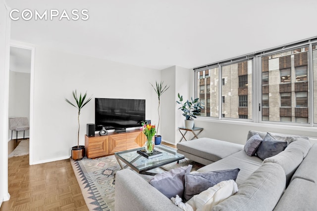 235 E 40th St Unit 11G, New York City, NY 10016 - living area with baseboards