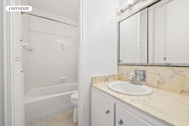 300 E 40th St Unit 7P, New York City, NY 10016 - full bath with vanity, tile patterned floors, washtub / shower combination, and decorative backsplash
