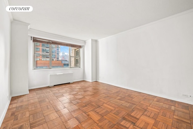 300 E 40th St Unit 7P, New York City, NY 10016 - empty room with radiator and crown molding