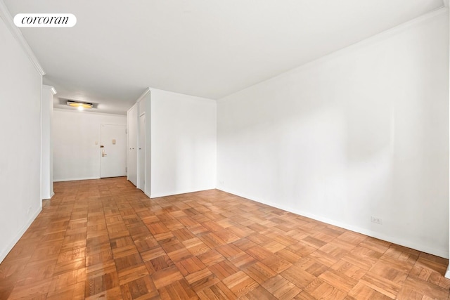 300 E 40th St Unit 7P, New York City, NY 10016 - spare room with baseboards