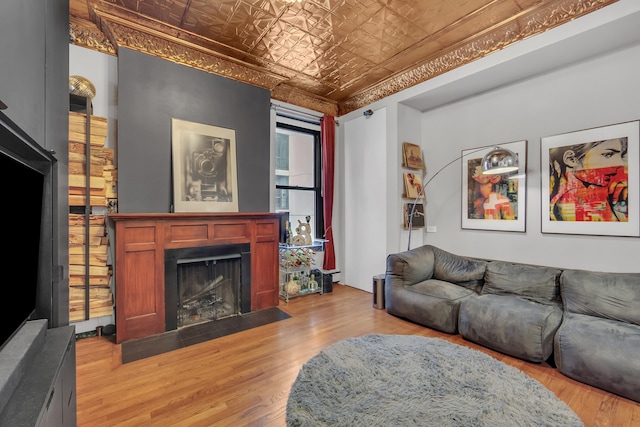 255 W 95th St Unit 4D, New York City, NY 10025 - living area with an ornate ceiling, a fireplace with flush hearth, and wood finished floors