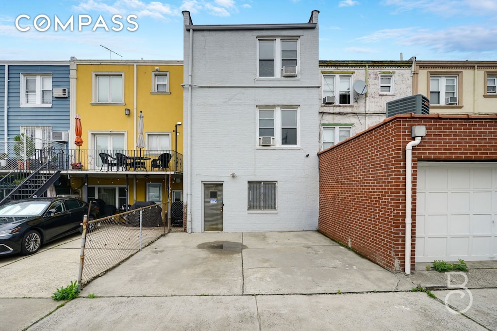 27-12 Ditmars Blvd, New York City, NY 11105 - back of property featuring brick siding
