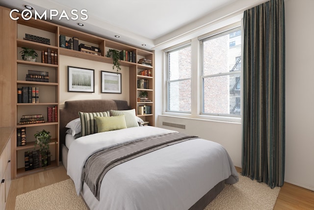 71 Park Ave Unit 12A, New York City, NY 10016 - bedroom featuring light wood finished floors and recessed lighting